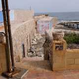 Toccati dalla nostalgica testimonianza di Michele, continuiamo a perlustrare lo stabilimento. Scendiamo cos� delle scale...